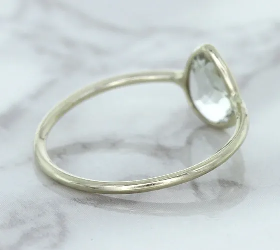 0.84ct. Pear Shape White Sapphire Ring in 14K White Gold