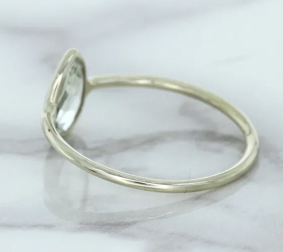 0.84ct. Pear Shape White Sapphire Ring in 14K White Gold