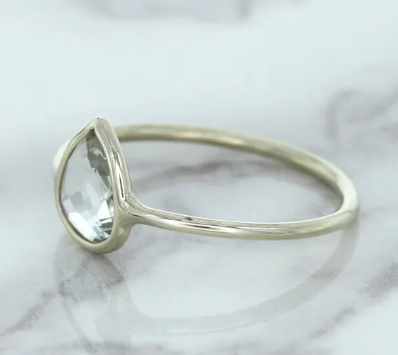 0.84ct. Pear Shape White Sapphire Ring in 14K White Gold