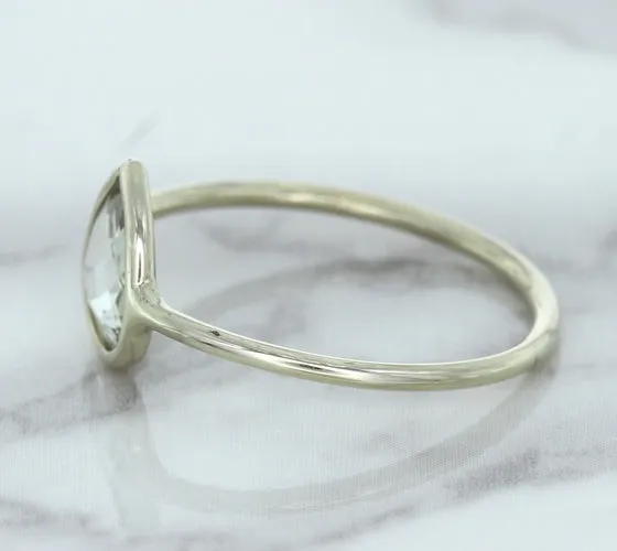 0.84ct. Pear Shape White Sapphire Ring in 14K White Gold