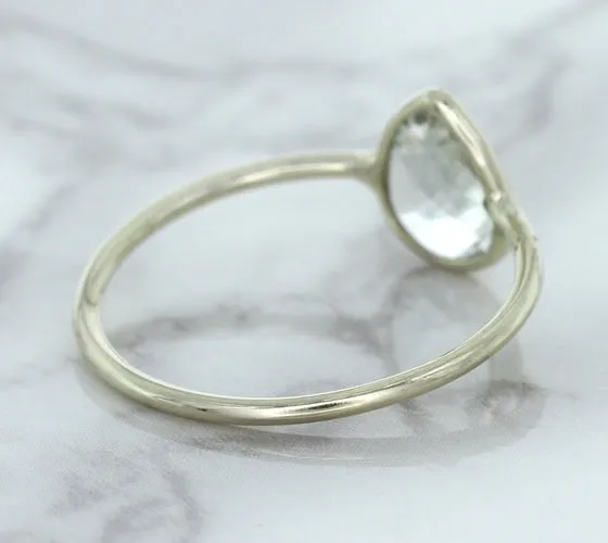 0.84ct. Pear Shape White Sapphire Ring in 14K White Gold