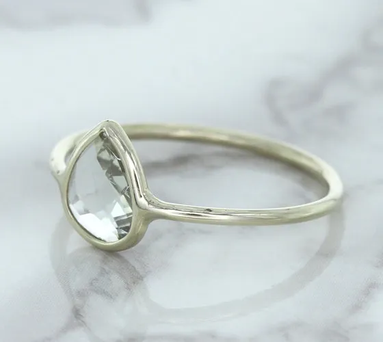 0.84ct. Pear Shape White Sapphire Ring in 14K White Gold