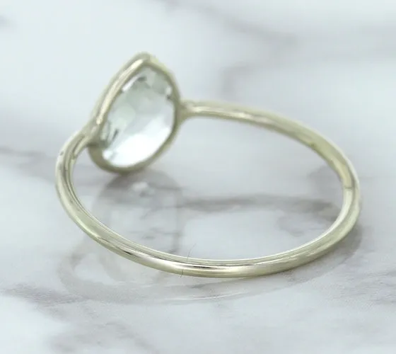 0.84ct. Pear Shape White Sapphire Ring in 14K White Gold