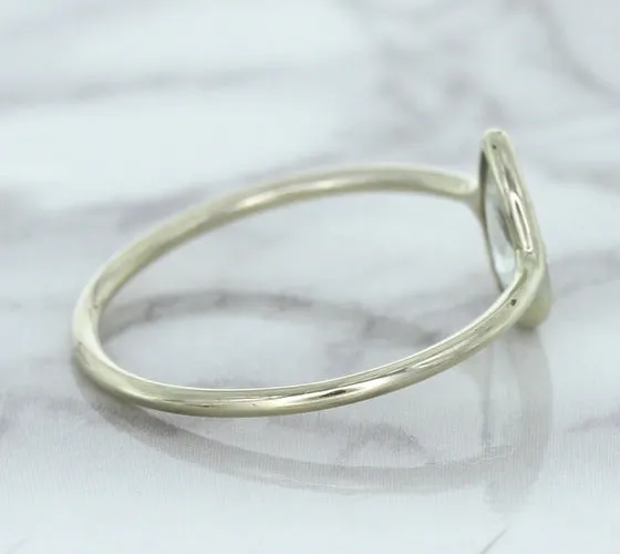 0.84ct. Pear Shape White Sapphire Ring in 14K White Gold