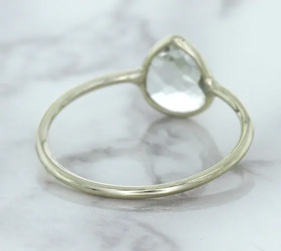 0.84ct. Pear Shape White Sapphire Ring in 14K White Gold