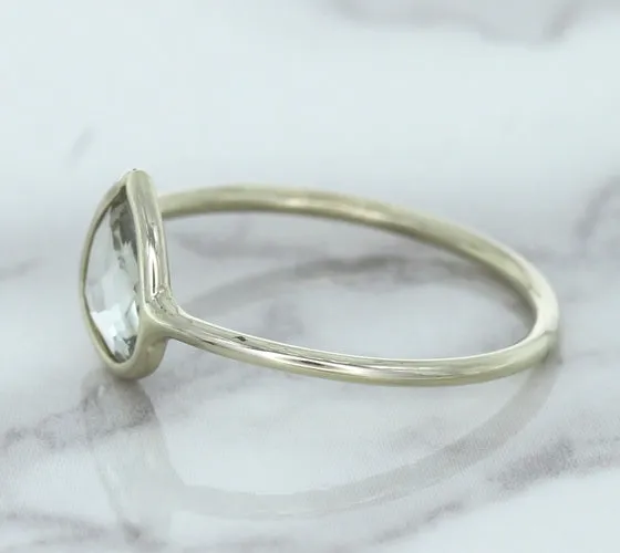 0.84ct. Pear Shape White Sapphire Ring in 14K White Gold