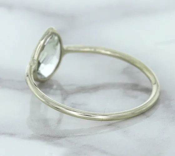 0.84ct. Pear Shape White Sapphire Ring in 14K White Gold