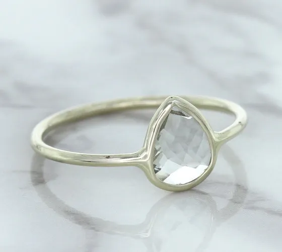 0.84ct. Pear Shape White Sapphire Ring in 14K White Gold