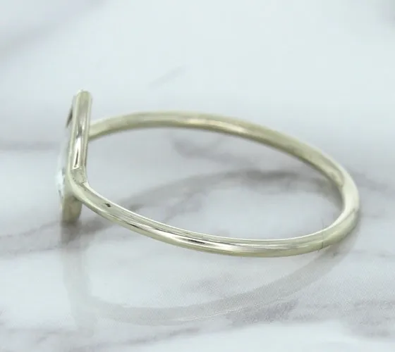 0.84ct. Pear Shape White Sapphire Ring in 14K White Gold