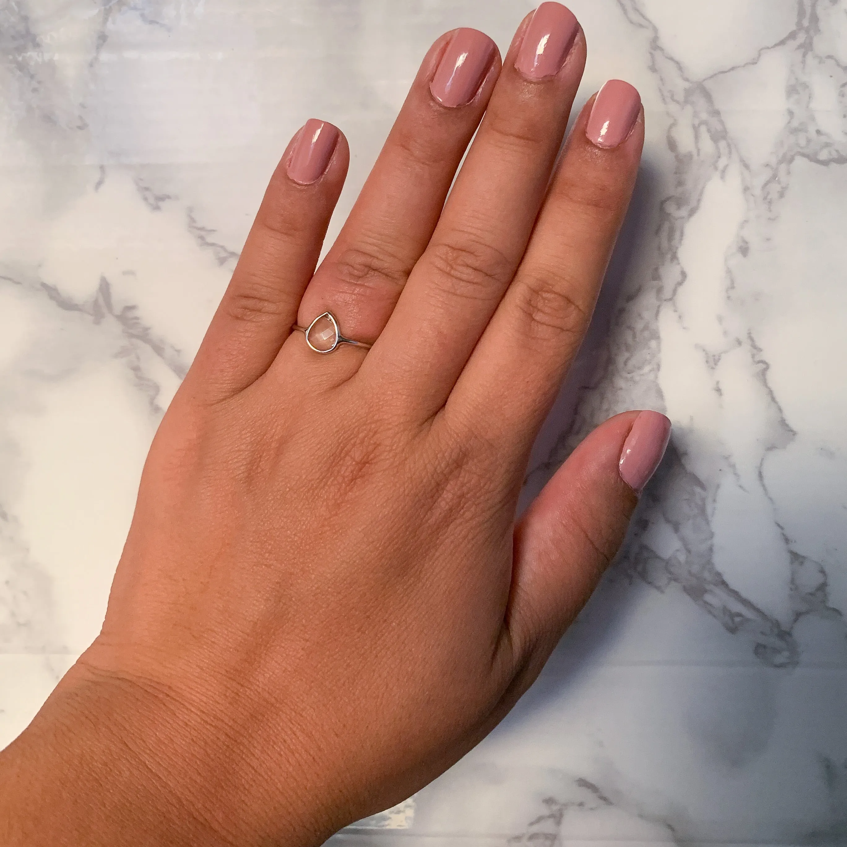 0.84ct. Pear Shape White Sapphire Ring in 14K White Gold