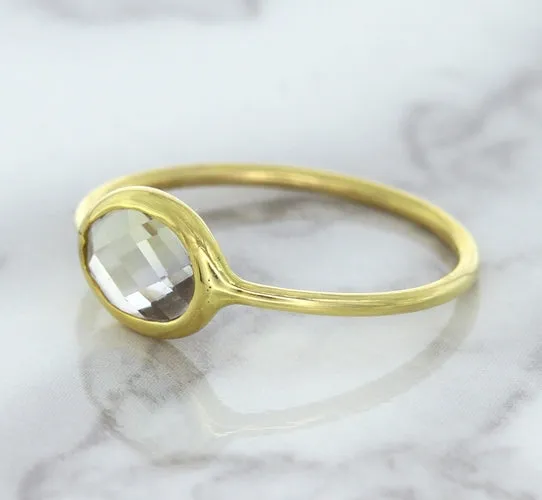 1.33ct. Oval White Sapphire Ring in 14K Yellow Gold