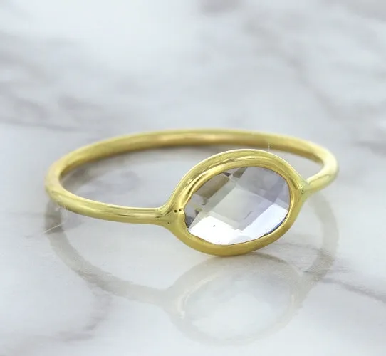 1.33ct. Oval White Sapphire Ring in 14K Yellow Gold