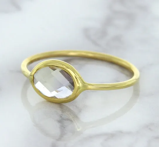 1.33ct. Oval White Sapphire Ring in 14K Yellow Gold