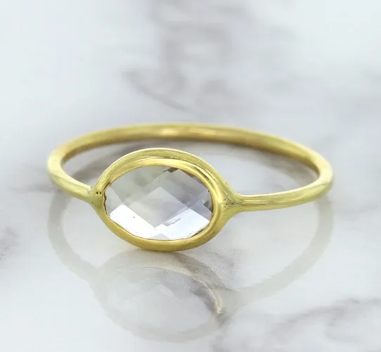 1.33ct. Oval White Sapphire Ring in 14K Yellow Gold