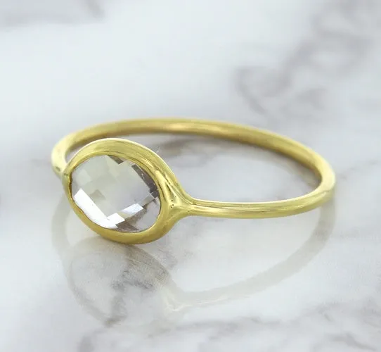 1.33ct. Oval White Sapphire Ring in 14K Yellow Gold