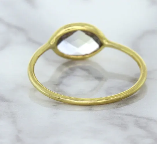 1.33ct. Oval White Sapphire Ring in 14K Yellow Gold