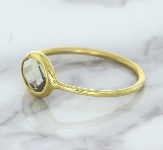 1.33ct. Oval White Sapphire Ring in 14K Yellow Gold