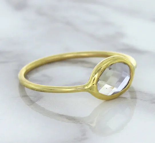 1.33ct. Oval White Sapphire Ring in 14K Yellow Gold