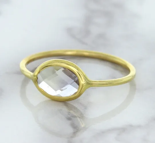 1.33ct. Oval White Sapphire Ring in 14K Yellow Gold