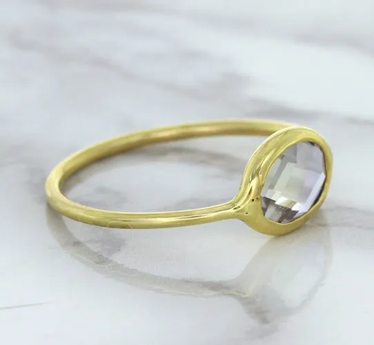 1.33ct. Oval White Sapphire Ring in 14K Yellow Gold