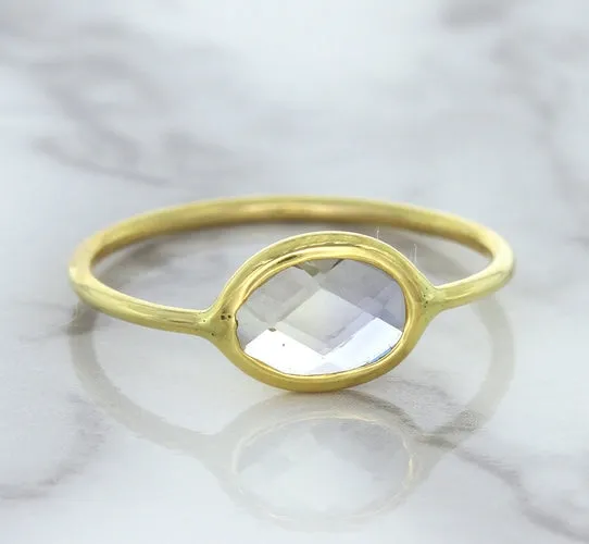 1.33ct. Oval White Sapphire Ring in 14K Yellow Gold