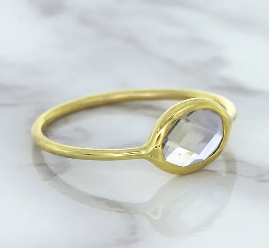 1.33ct. Oval White Sapphire Ring in 14K Yellow Gold