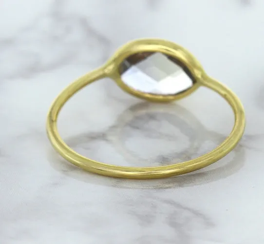 1.33ct. Oval White Sapphire Ring in 14K Yellow Gold