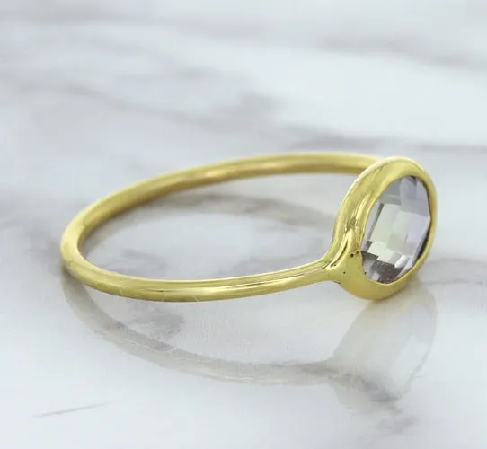 1.33ct. Oval White Sapphire Ring in 14K Yellow Gold