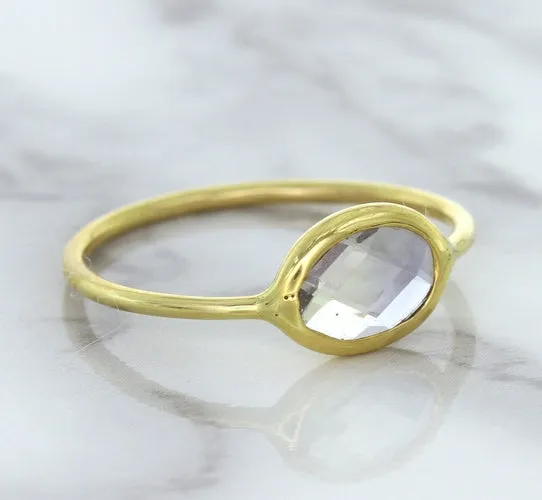 1.33ct. Oval White Sapphire Ring in 14K Yellow Gold