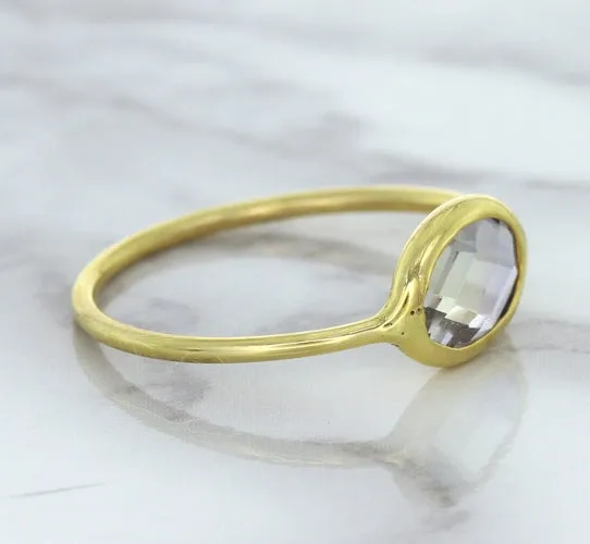 1.33ct. Oval White Sapphire Ring in 14K Yellow Gold