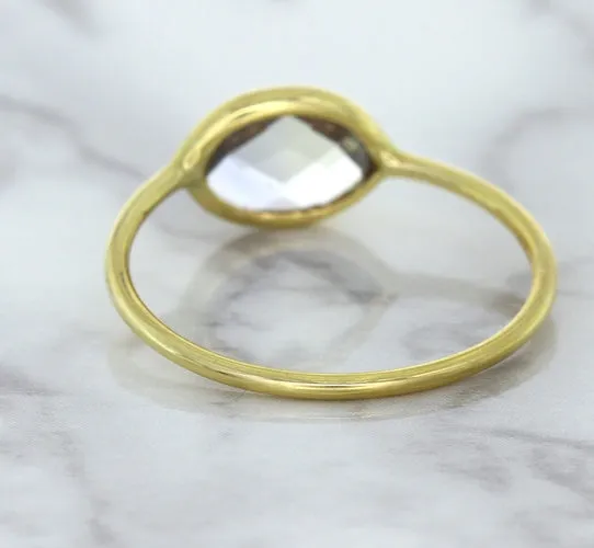 1.33ct. Oval White Sapphire Ring in 14K Yellow Gold
