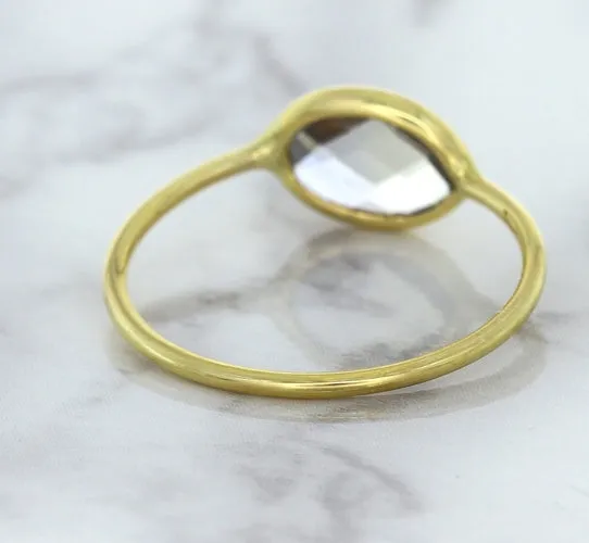 1.33ct. Oval White Sapphire Ring in 14K Yellow Gold