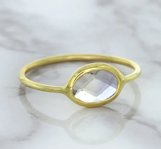 1.33ct. Oval White Sapphire Ring in 14K Yellow Gold