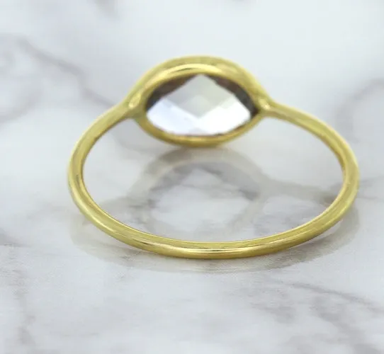 1.33ct. Oval White Sapphire Ring in 14K Yellow Gold