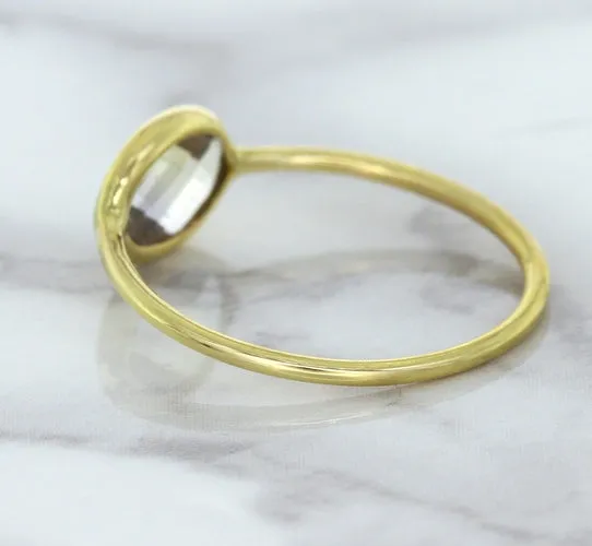 1.33ct. Oval White Sapphire Ring in 14K Yellow Gold