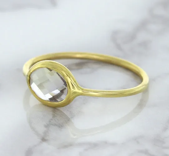1.33ct. Oval White Sapphire Ring in 14K Yellow Gold
