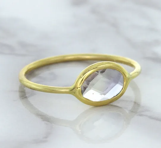 1.33ct. Oval White Sapphire Ring in 14K Yellow Gold