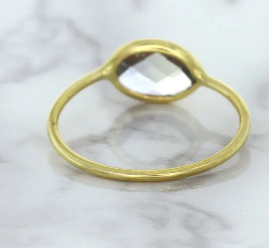 1.33ct. Oval White Sapphire Ring in 14K Yellow Gold