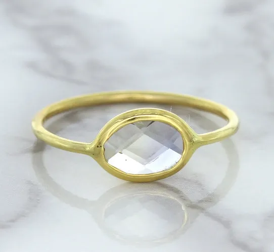 1.33ct. Oval White Sapphire Ring in 14K Yellow Gold
