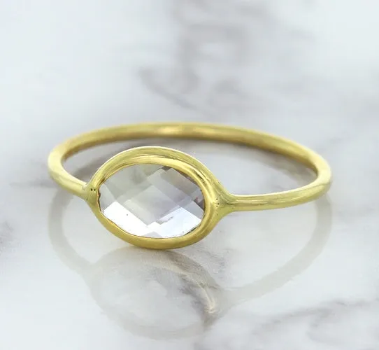1.33ct. Oval White Sapphire Ring in 14K Yellow Gold