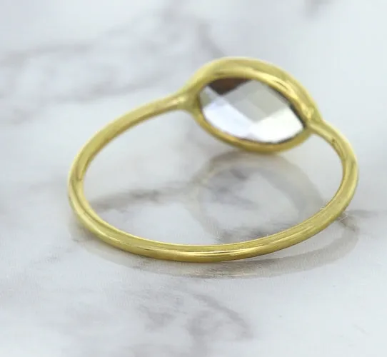 1.33ct. Oval White Sapphire Ring in 14K Yellow Gold