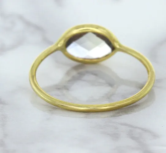 1.33ct. Oval White Sapphire Ring in 14K Yellow Gold
