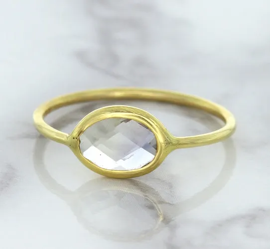 1.33ct. Oval White Sapphire Ring in 14K Yellow Gold