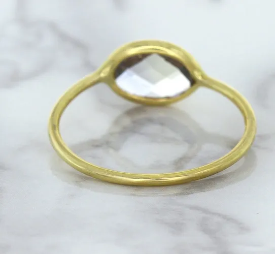 1.33ct. Oval White Sapphire Ring in 14K Yellow Gold