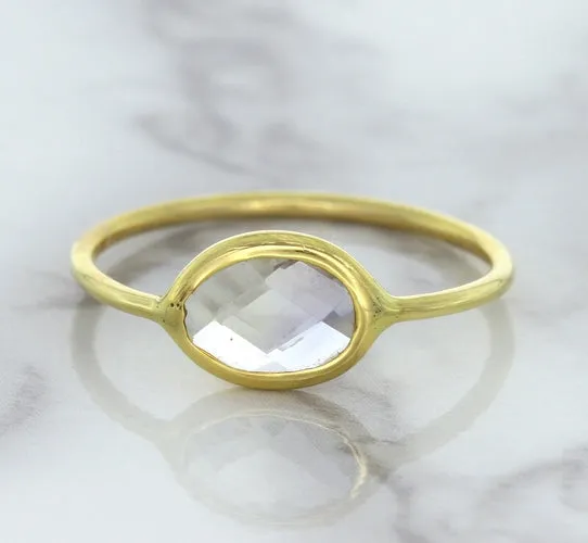 1.33ct. Oval White Sapphire Ring in 14K Yellow Gold