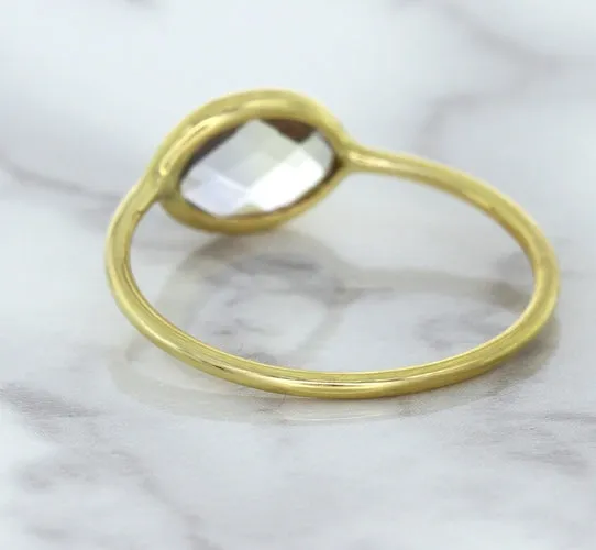 1.33ct. Oval White Sapphire Ring in 14K Yellow Gold