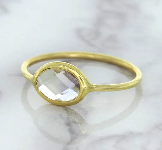 1.33ct. Oval White Sapphire Ring in 14K Yellow Gold