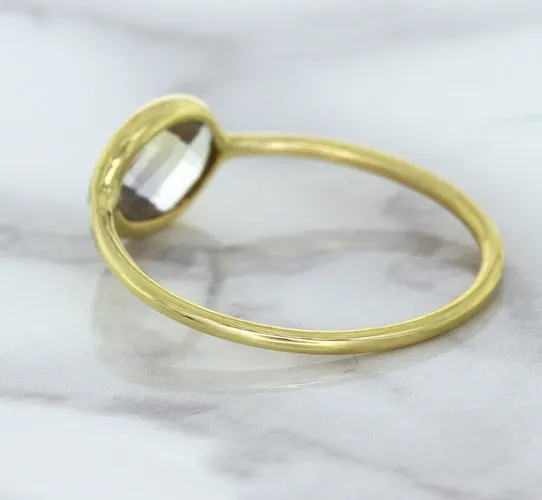 1.33ct. Oval White Sapphire Ring in 14K Yellow Gold