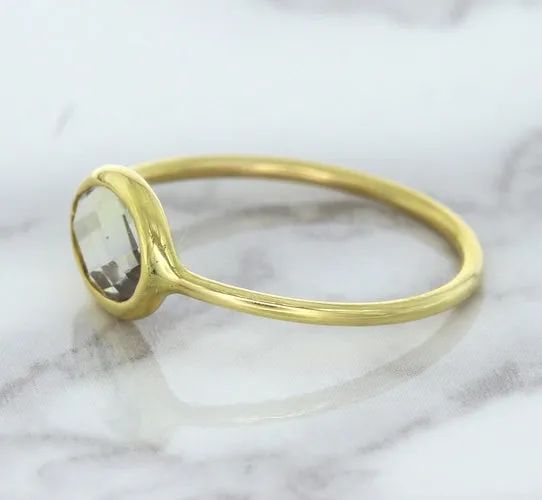 1.33ct. Oval White Sapphire Ring in 14K Yellow Gold