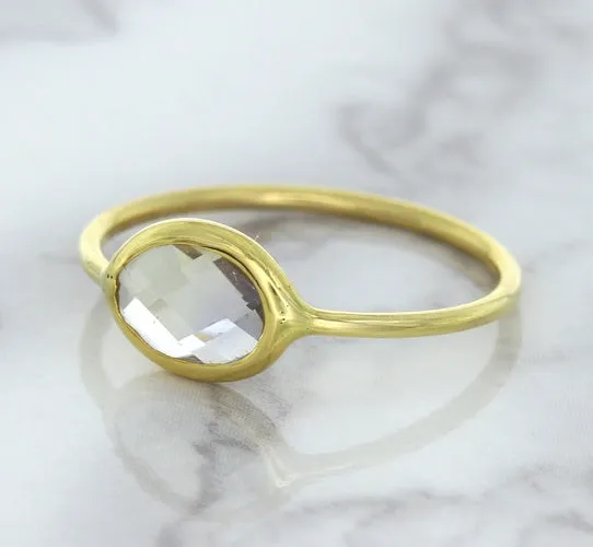 1.33ct. Oval White Sapphire Ring in 14K Yellow Gold